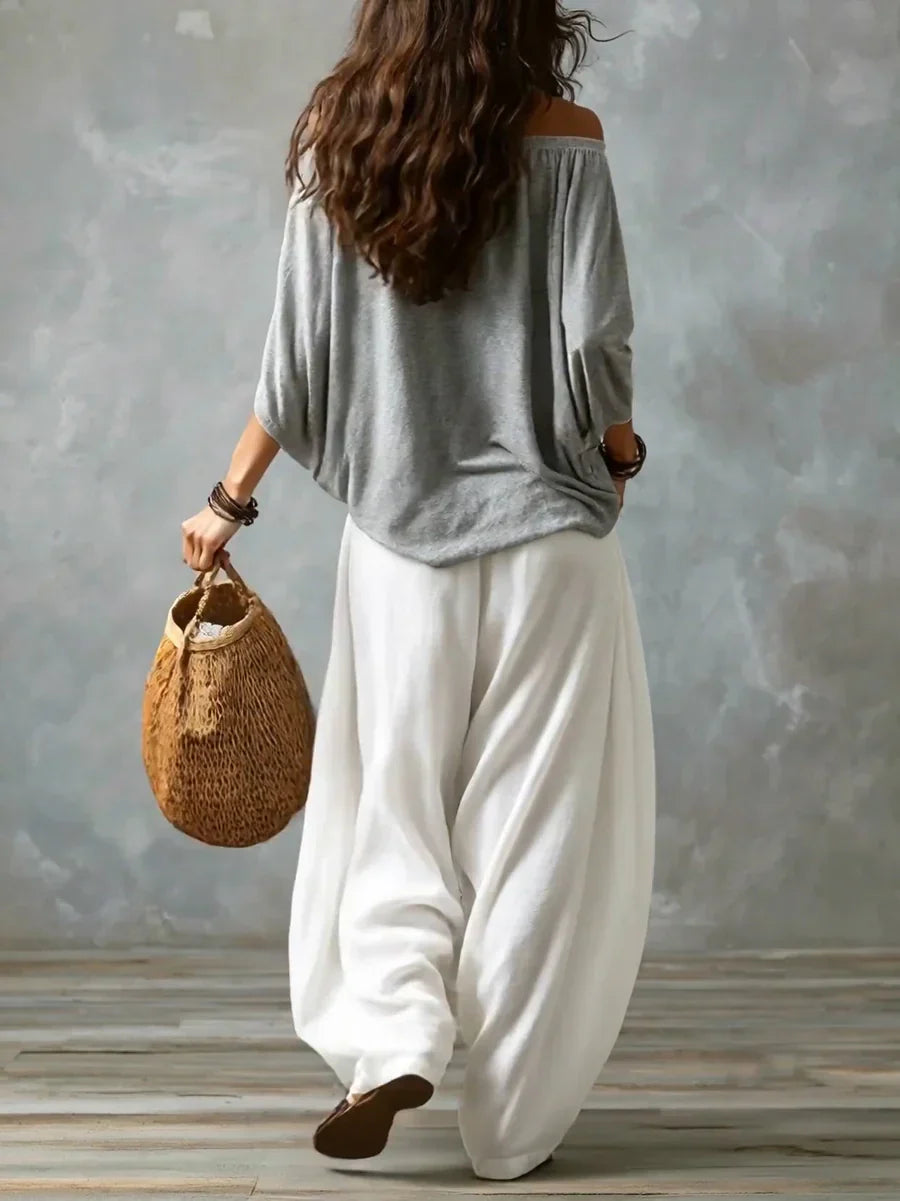Aurara — Komplettes asymmetrisches Top und weit geschnittene Palazzo-Hose