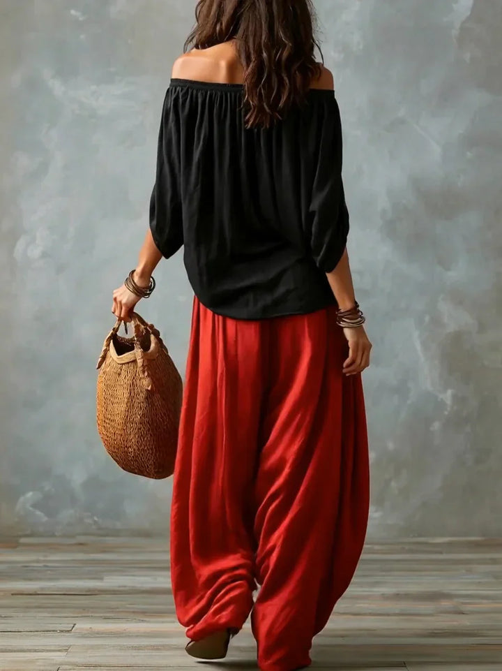Aurara — Komplettes asymmetrisches Top und weit geschnittene Palazzo-Hose